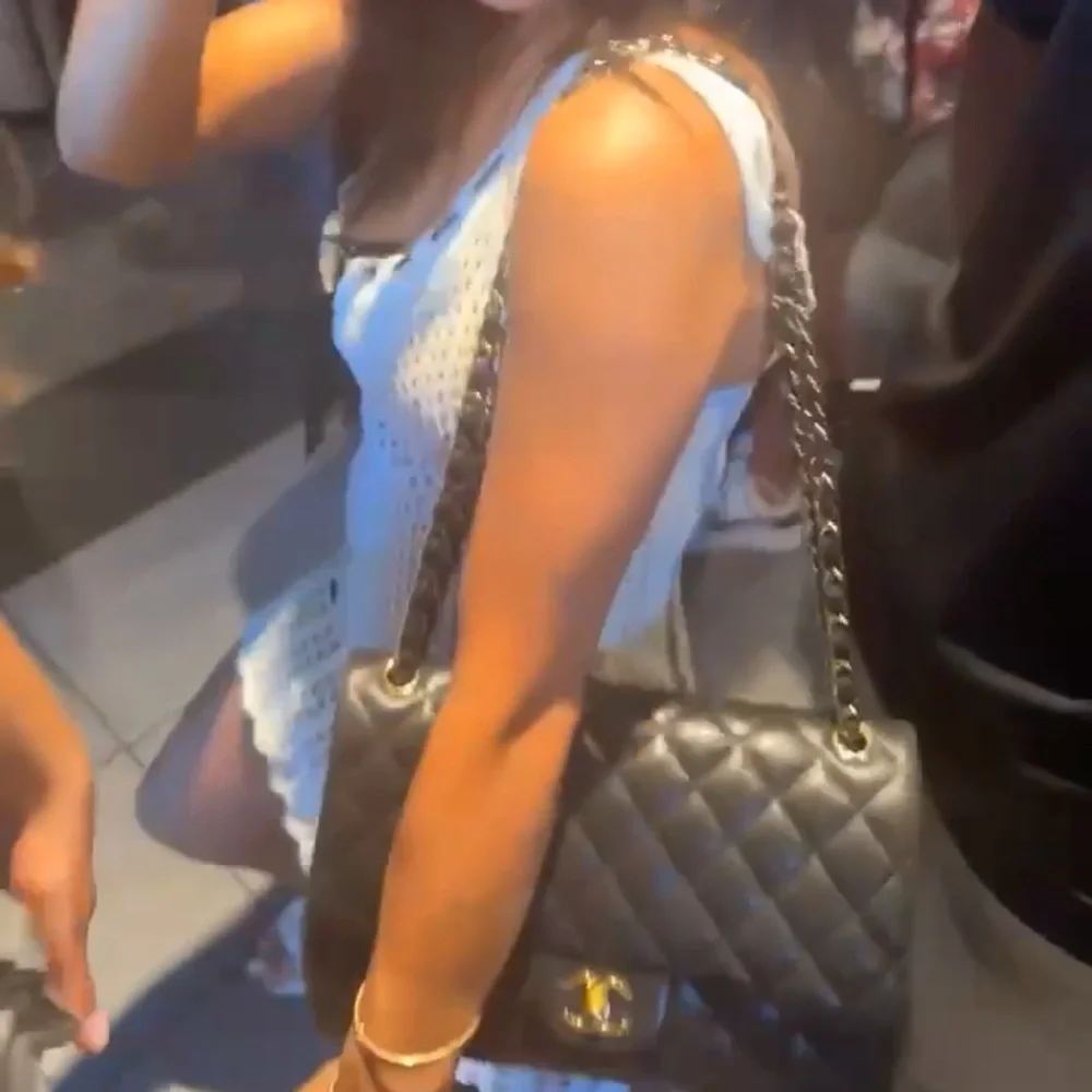 CHANEL Black Quilted Lambskin Shoulder Bag with Gold Chain